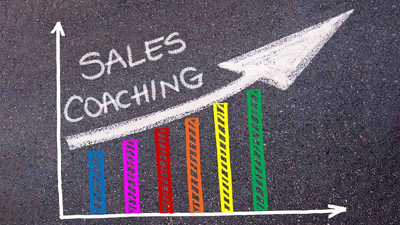 Hand-drawn upward-trending bar graph with arrow labeled "Sales Coaching."