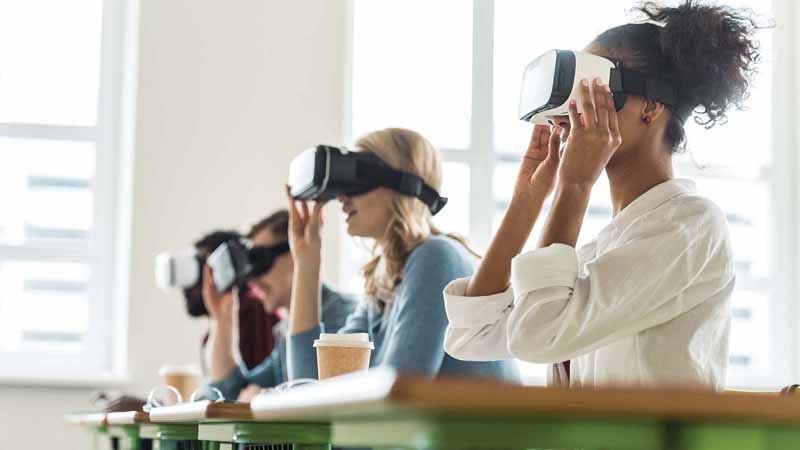 People using virtual reality headsets.