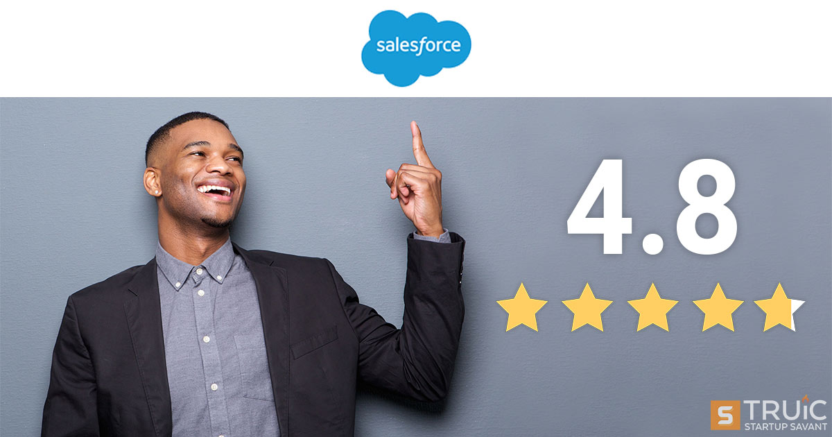 Smiling businessman next to 4.8 stars and pointing at Salesforce logo.