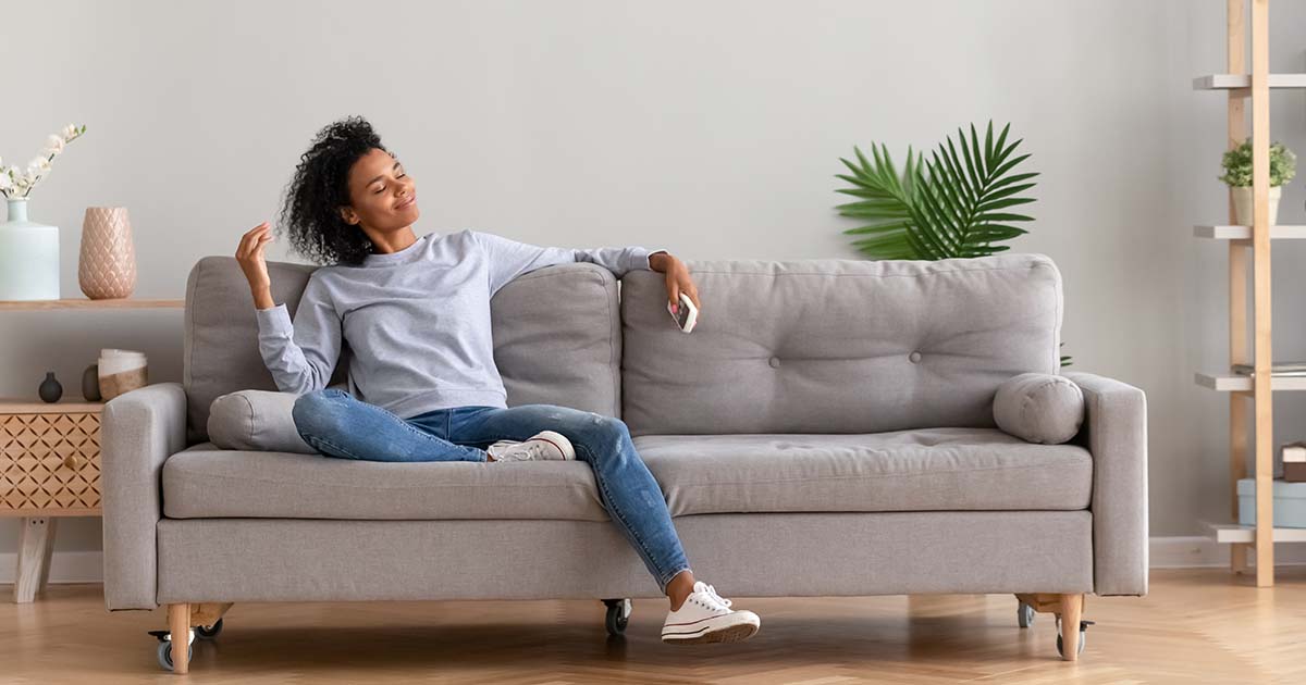 Woman relaxing on a couch.